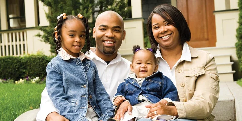 Family On House Steps | Crown Carpet, Inc. | Sun City West, Arizona